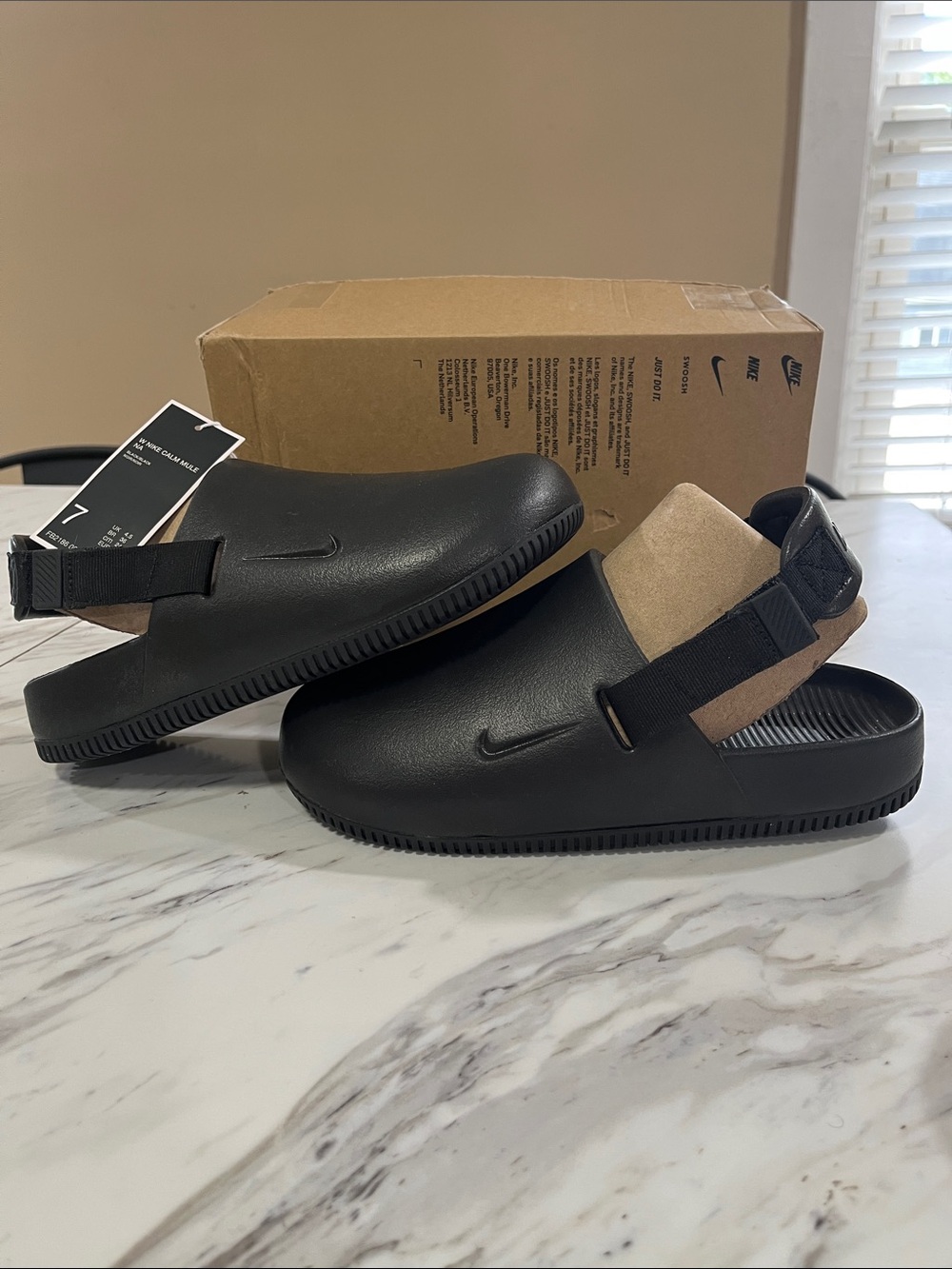 Nike Black Slide Sandals with Tan Back Strap